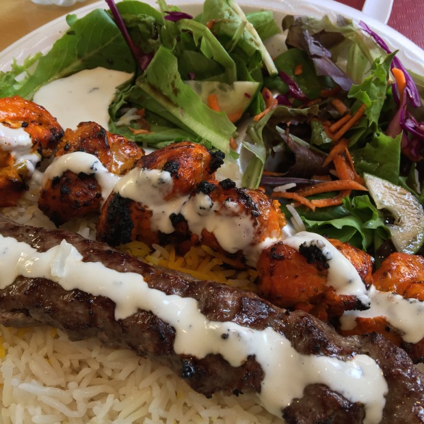 Beef koobideh, chicken breast kabob, buttery rice, a pleasantly vinegary salad, and a touch of yogurt sauce made a really nice lunch.